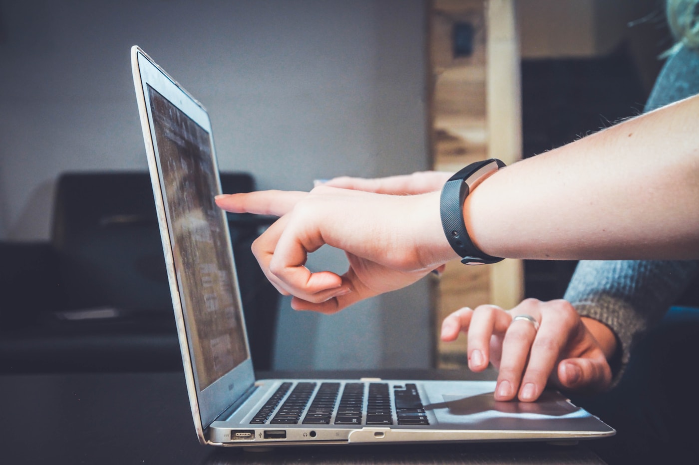 Creative professional editing a video campaign on a laptop.